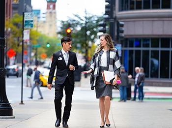 Two students walking in Chicago