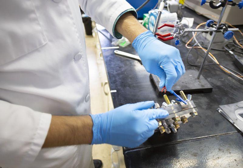 A research student builds a solar fuel cell at Armour